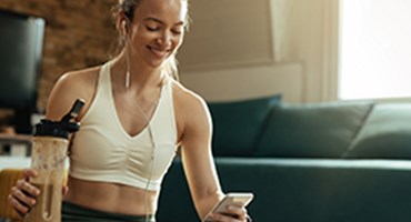 Woman sitting during a workout.