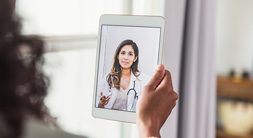 person looking at nurse on call on a tablet