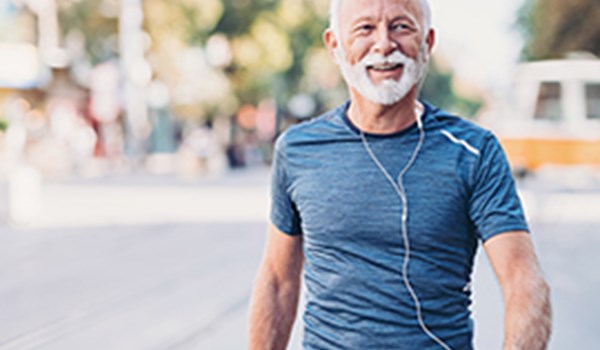 Senior man walking outdoors